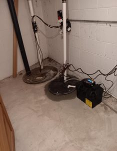 Basement waterproofing solutions by Basement Repair Specialists, showcasing interior drainage and sump pump systems.