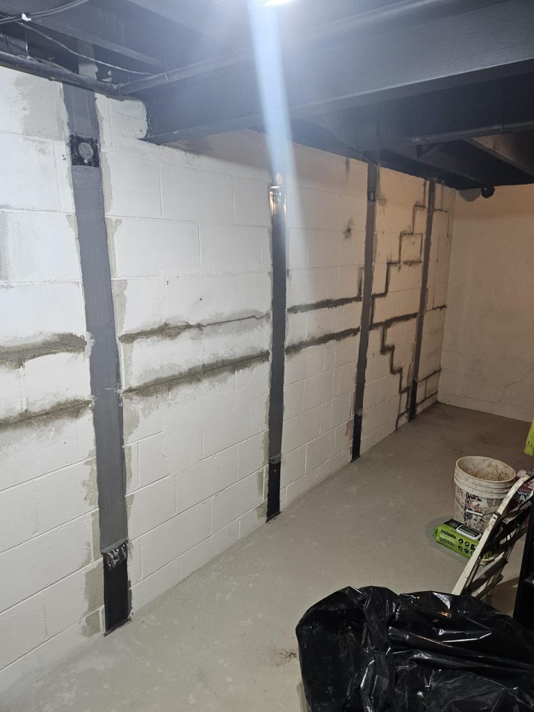 Bowing Basement Wall Repair in Wisconsin: Carbon Fiber vs. Wall Anchors
